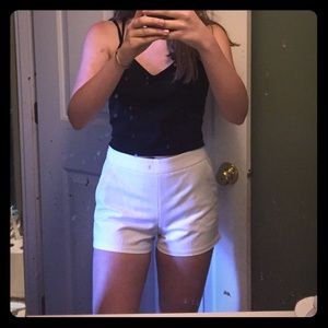 White high waisted shorts.